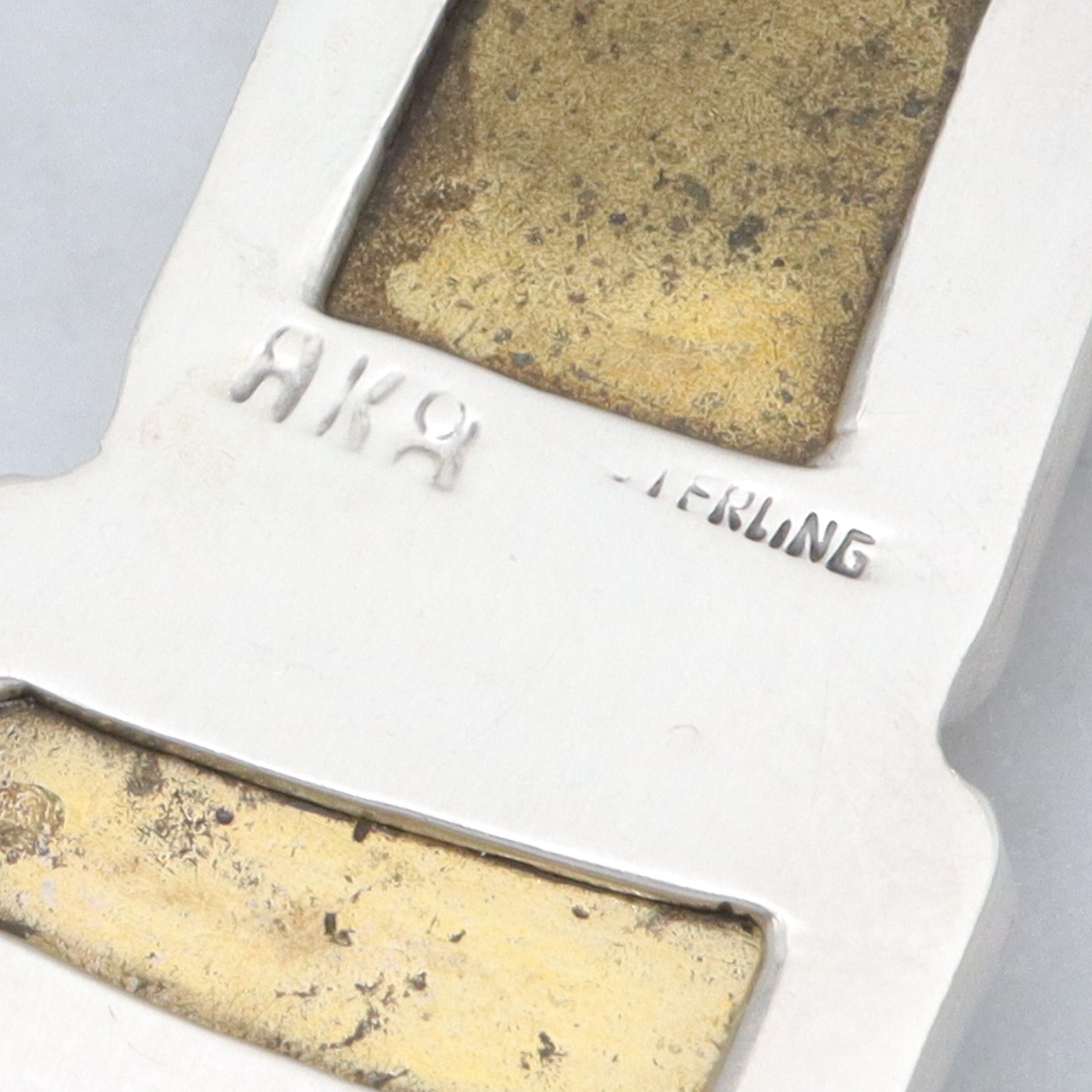 Retro Amy Kahn Russel sterling & carved pyrite pendant